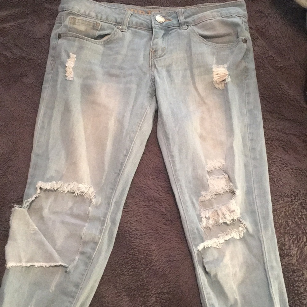 Baby blue ripped jeans